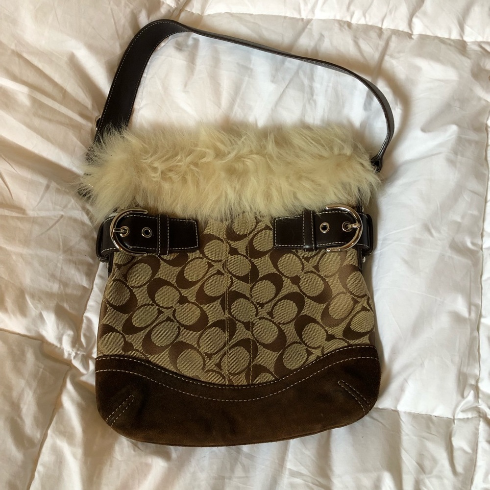 Fur trimmed Coach purse